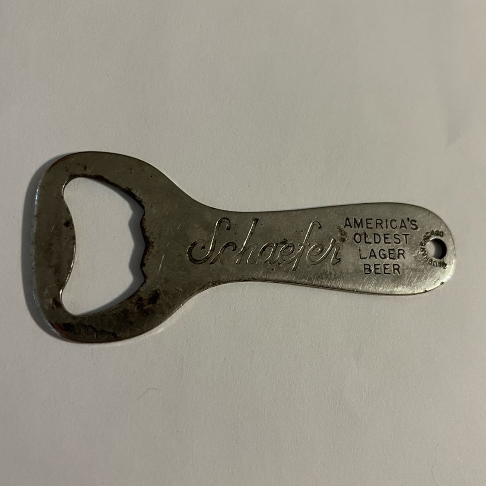 Vintage Schaefer metal bottle opener
